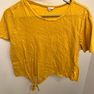 yellow t-shirt.